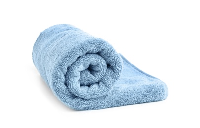 Rolled soft terry towel on white background