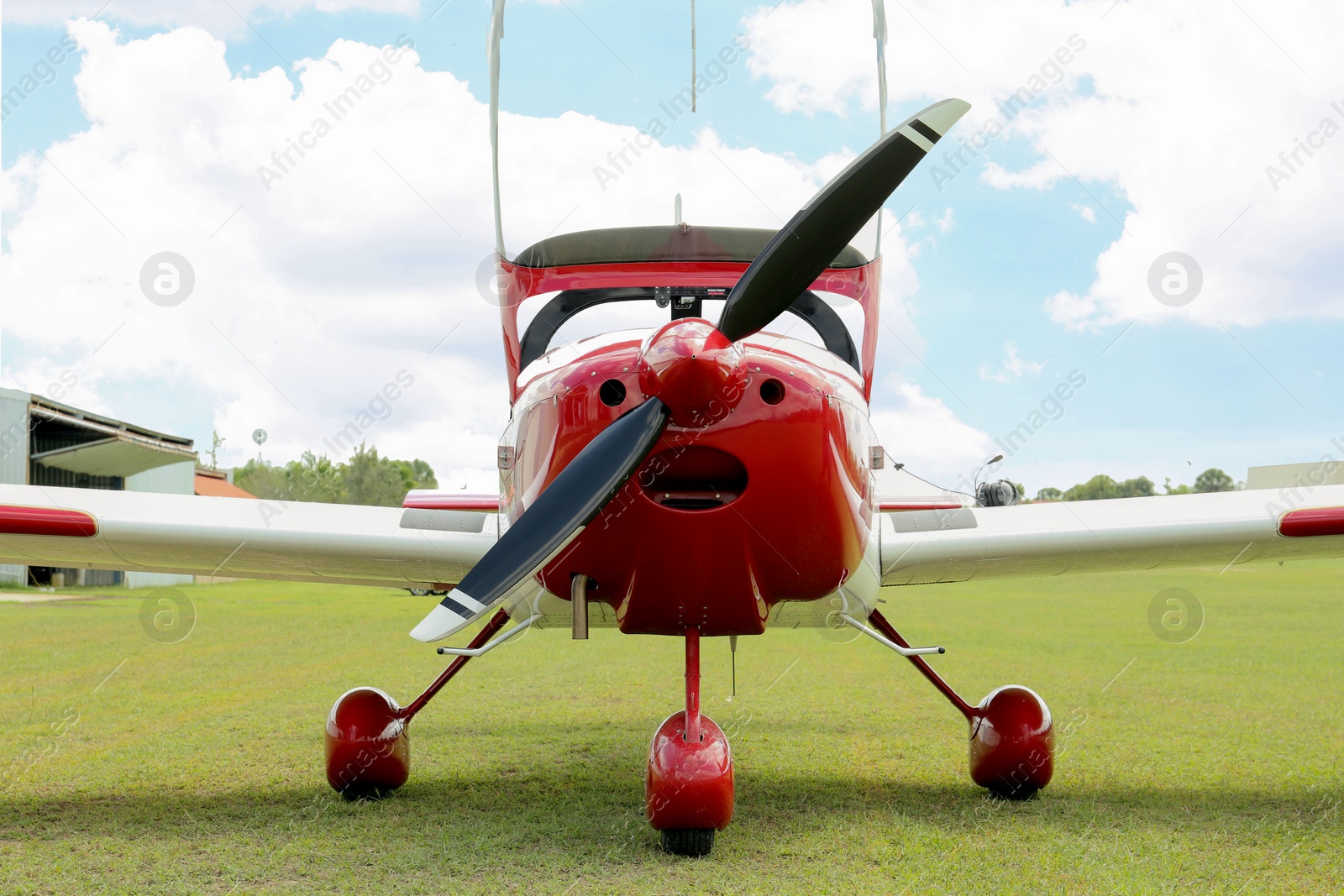 Photo of New ultralight aircraft on green grass outdoors