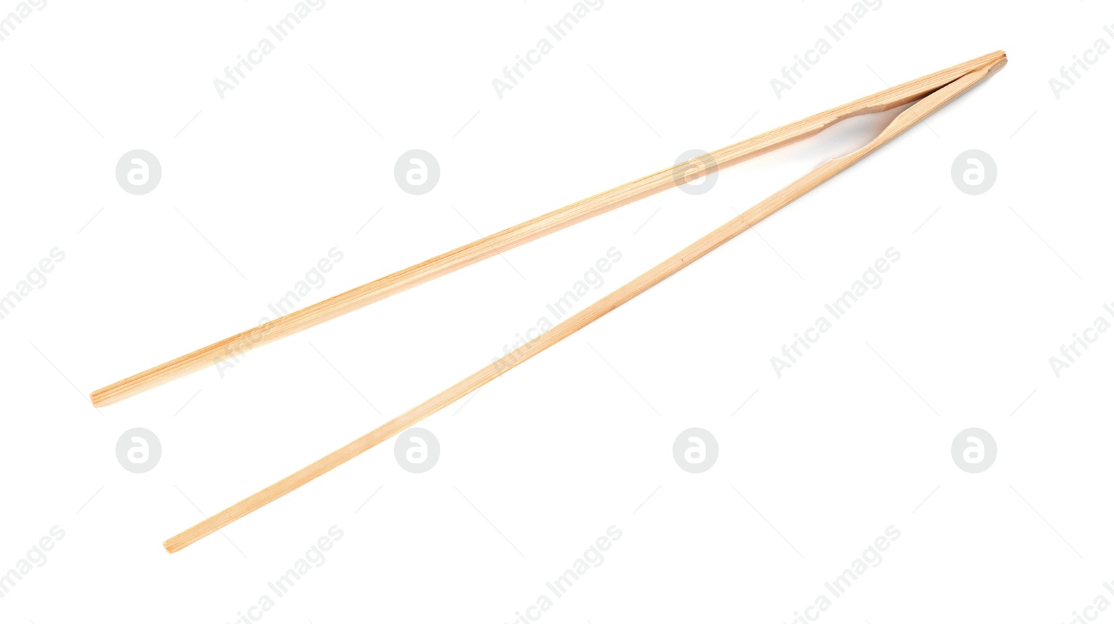 Photo of Tongs made of bamboo on white background, top view