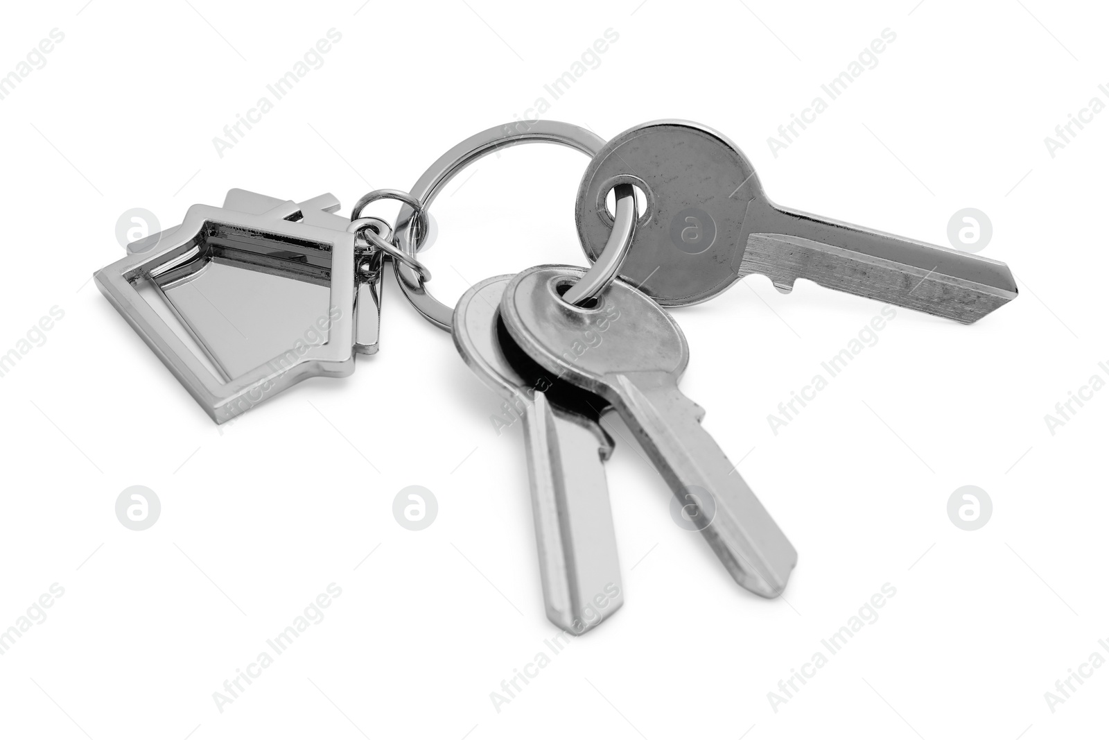 Photo of Keys with keychain in shape of house isolated on white