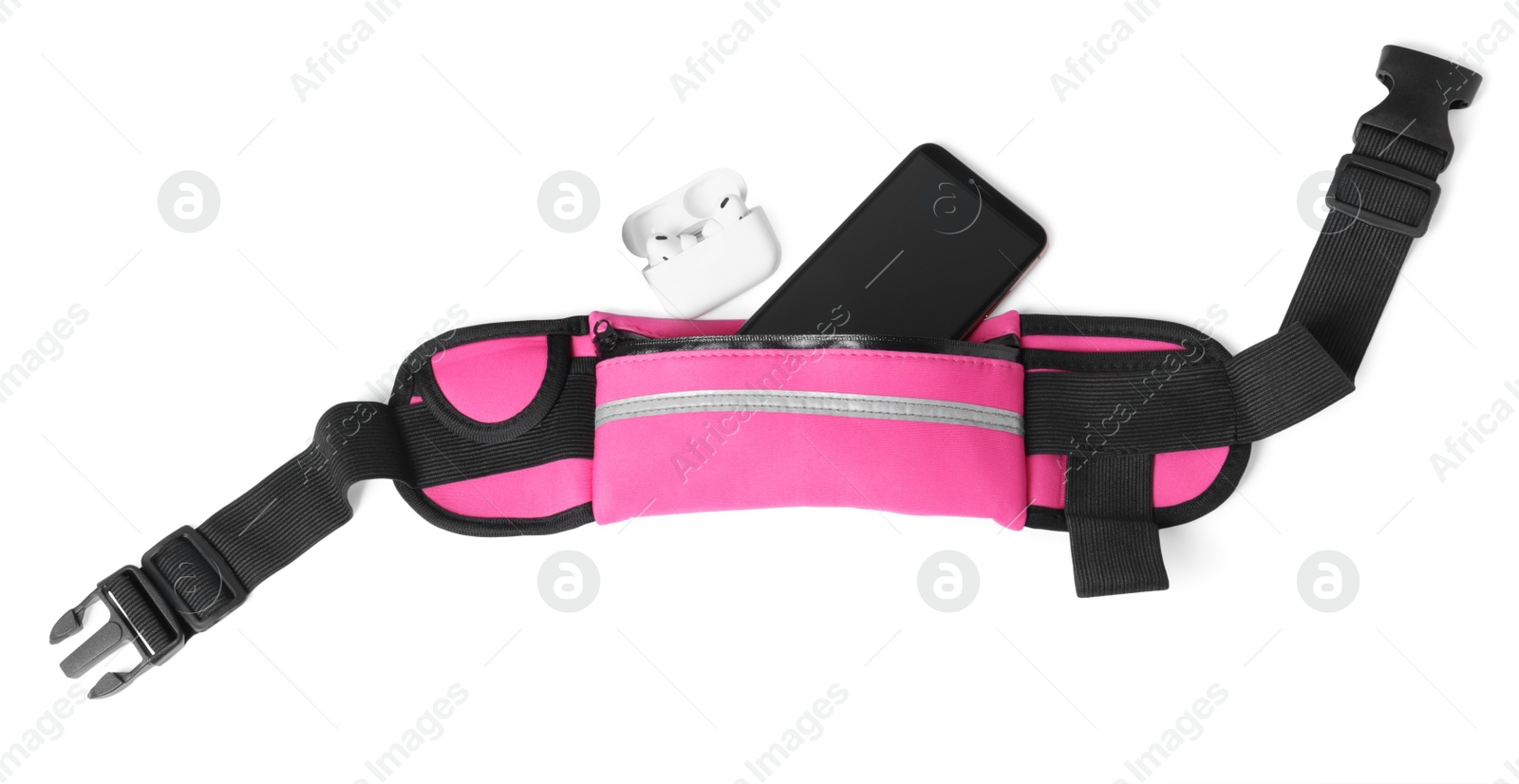 Photo of Stylish pink waist bag with smartphone and earphones on white background, top view