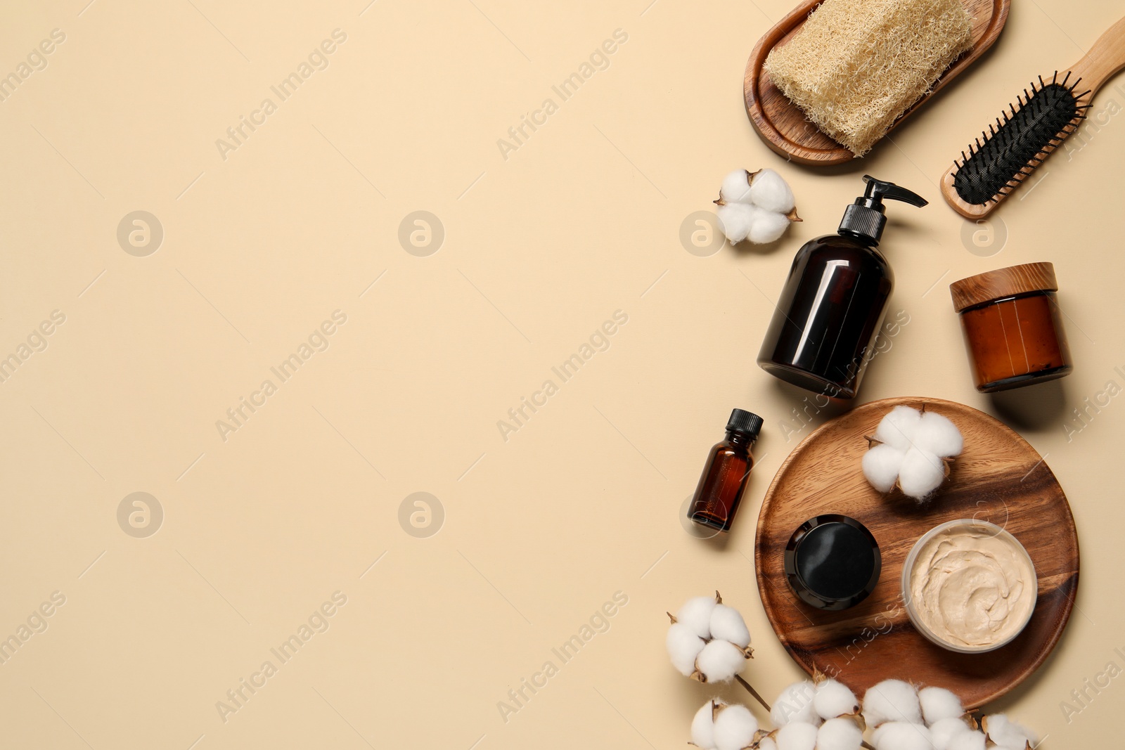 Photo of Bath accessories. Flat lay composition with personal care products on beige background, space for text