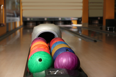 Rack with different balls in bowling club