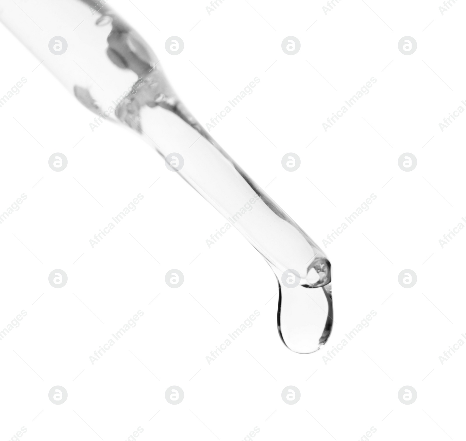 Photo of Dripping liquid from pipette isolated on white, closeup