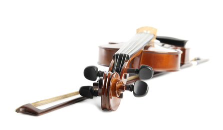 Beautiful classic violin and bow on white background. Musical instrument