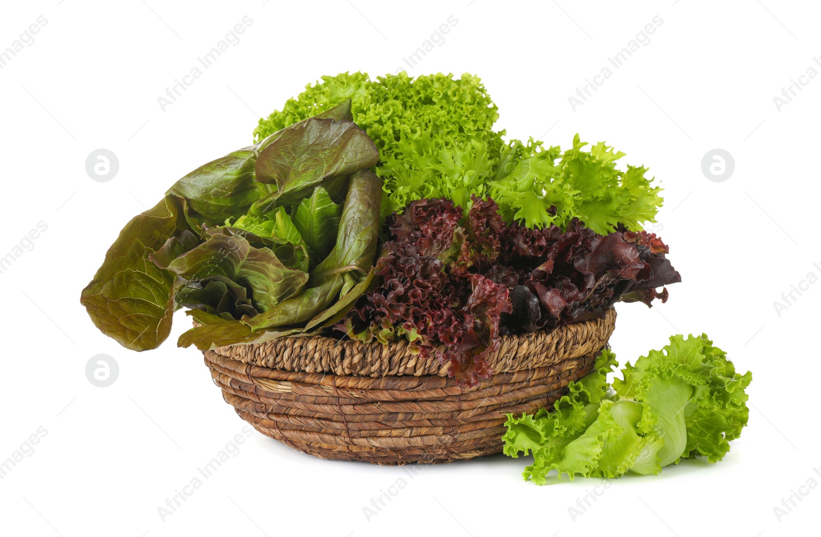 Photo of Basket and different sorts of lettuce on white background