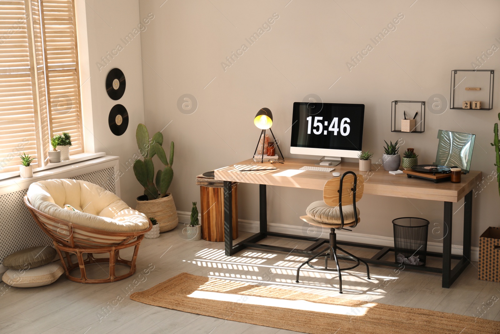 Photo of Room interior with comfortable workplace. Modern computer on wooden desk