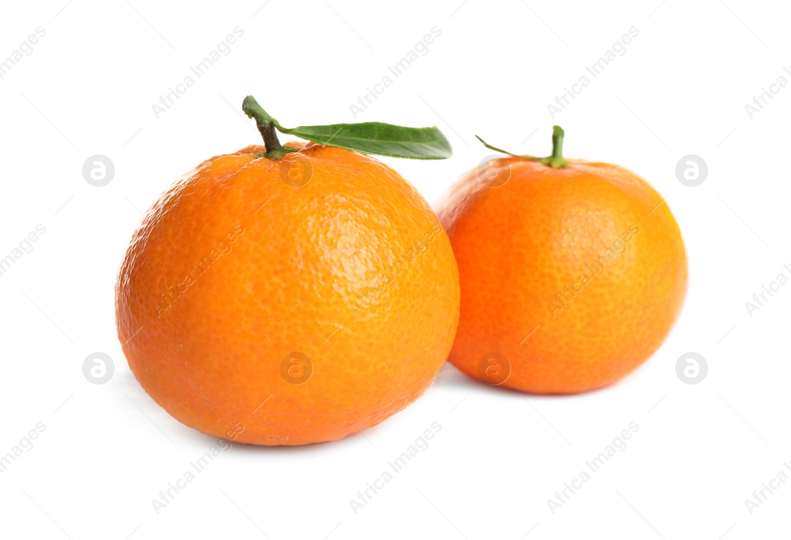 Photo of Fresh ripe juicy tangerines isolated on white