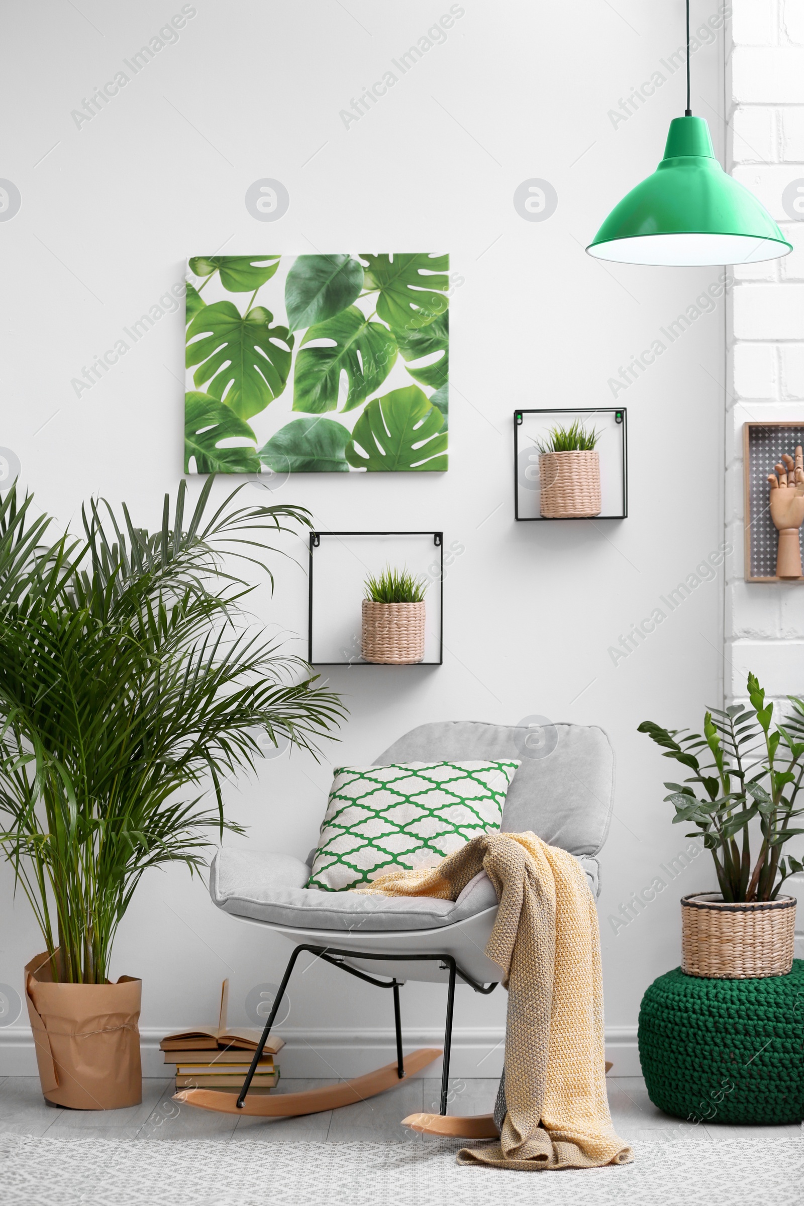 Photo of Stylish modern room interior with exotic houseplants