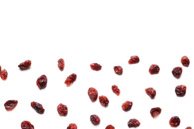 Photo of Flat lay composition of cranberries on white background, space for text. Dried fruit as healthy snack