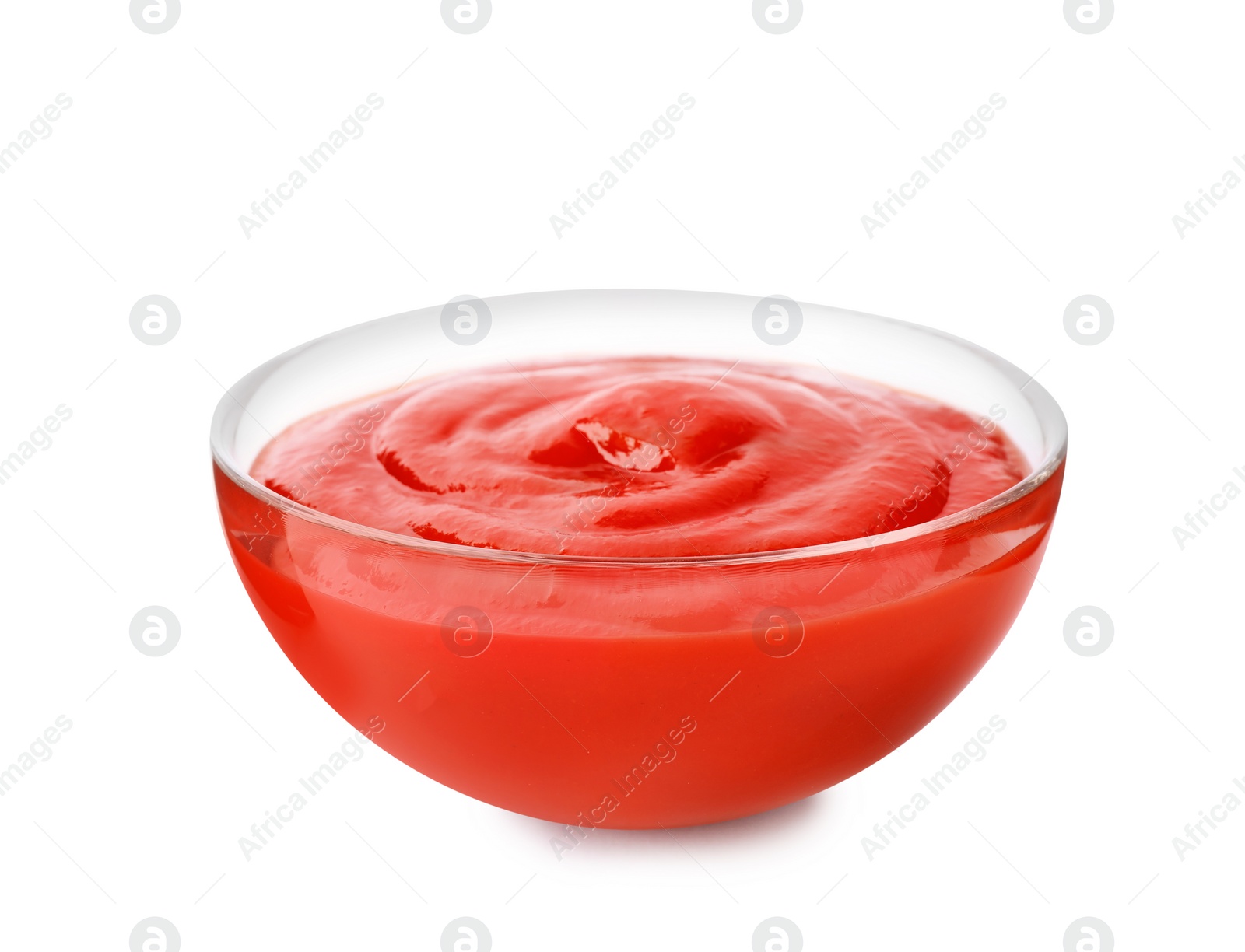 Photo of Tasty tomato sauce in glass bowl isolated on white