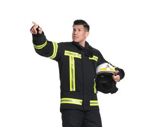 Portrait of firefighter in uniform with helmet on white background