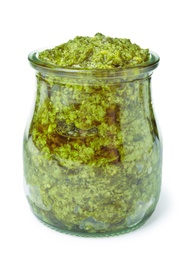 Photo of Jar of tasty pesto sauce isolated on white