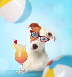 Cute dog in sunglasses with cocktail on light blue background. Summer party