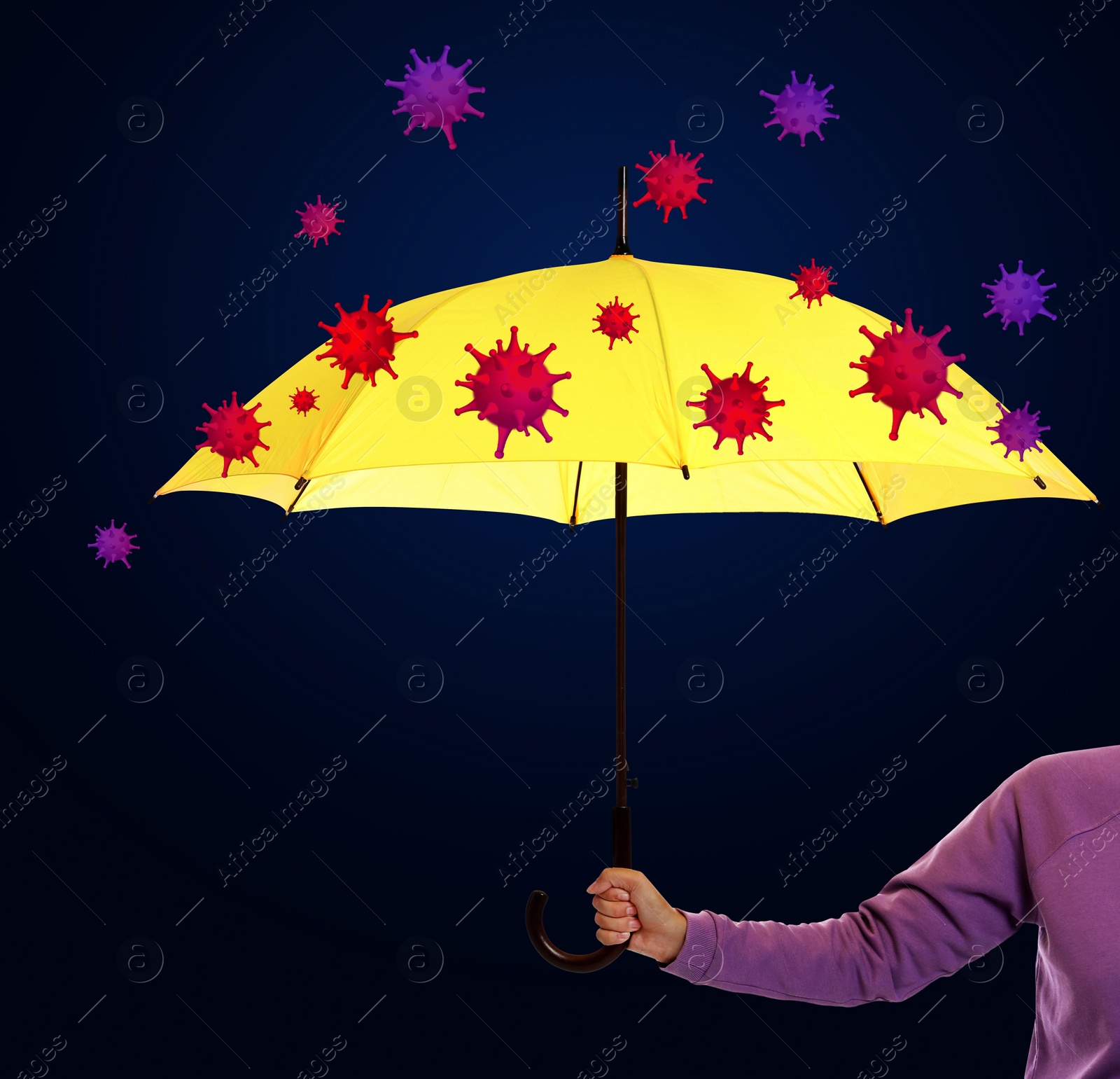 Image of Woman blocking viruses with yellow umbrella as symbol of strong immunity