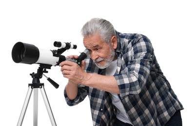 Senior astronomer looking at stars through telescope on white background