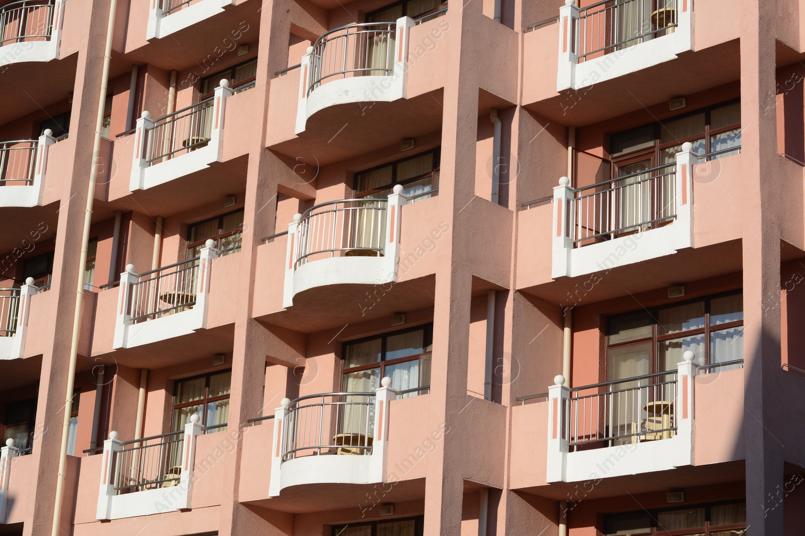 Photo of Exterior of beautiful residential building with balconies