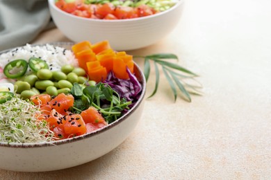 Photo of Delicious poke bowls with vegetables, fish and edamame beans on light table, closeup. Space for text