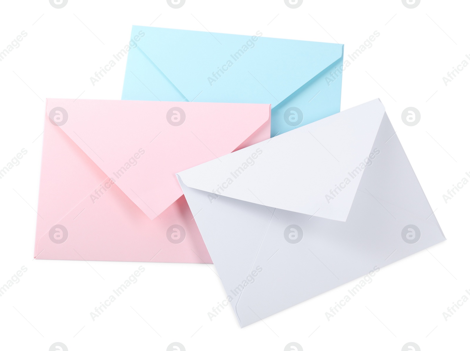 Photo of Three letter envelopes isolated on white, above view