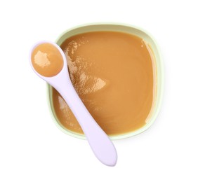 Tasty baby food in bowl and spoon isolated on white, top view