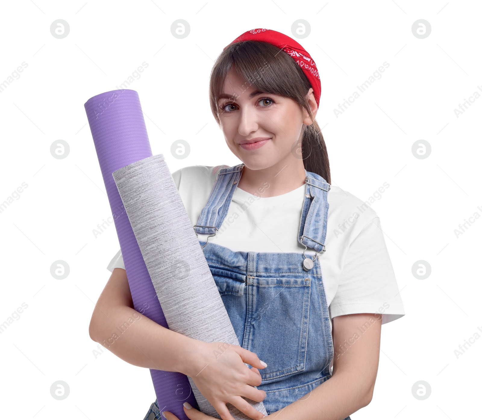 Photo of Beautiful woman with wallpaper rolls on white background