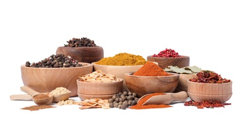 Photo of Bowls with different spices on white background