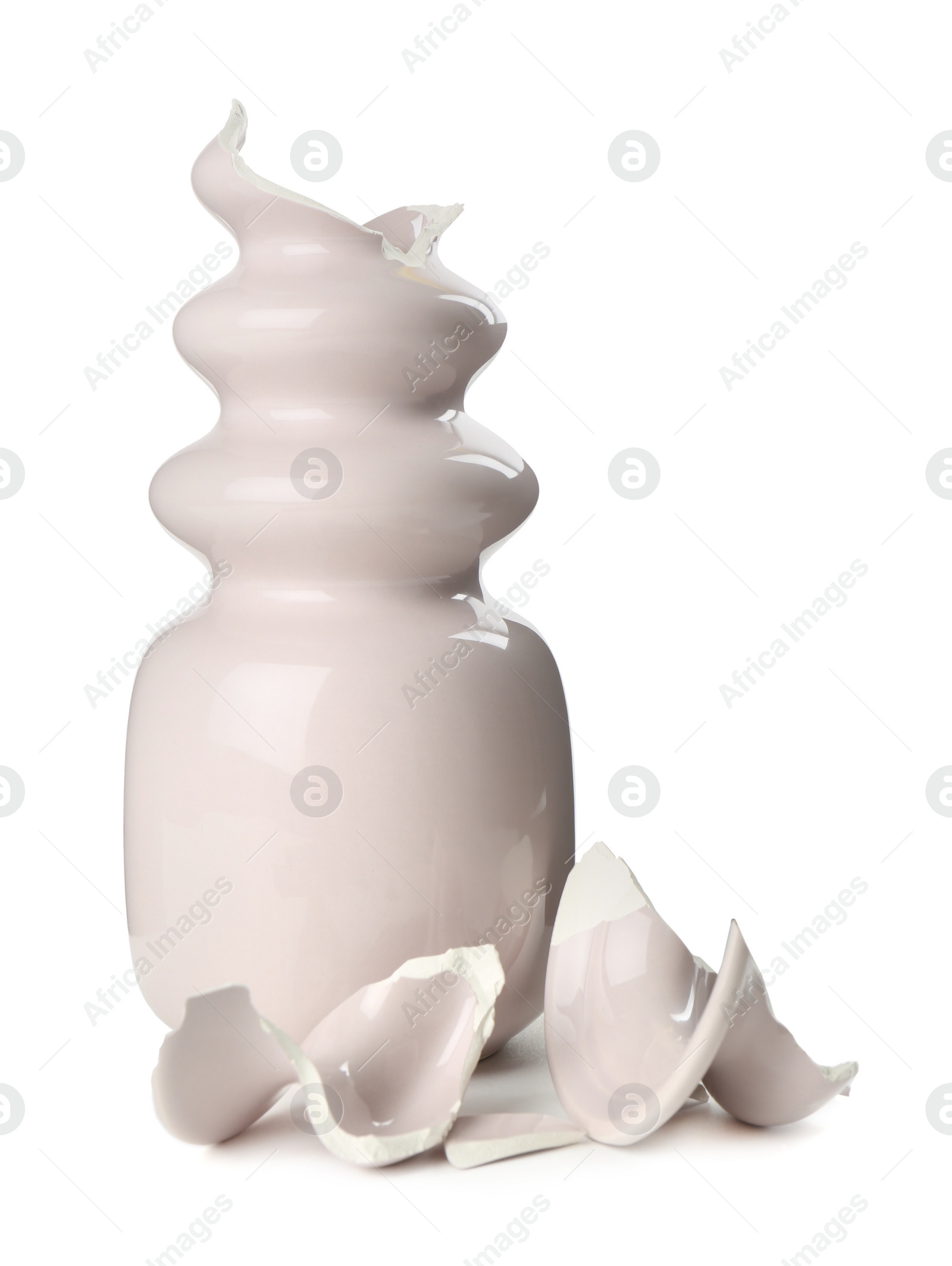 Photo of Broken pink ceramic vase isolated on white