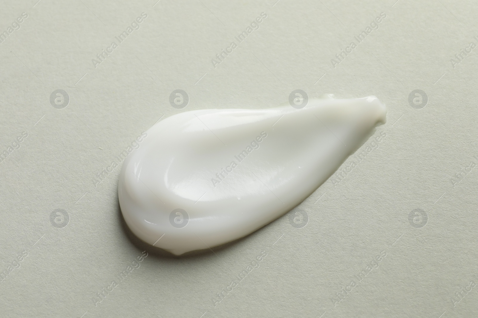 Photo of Sample of face mask on light background, top view