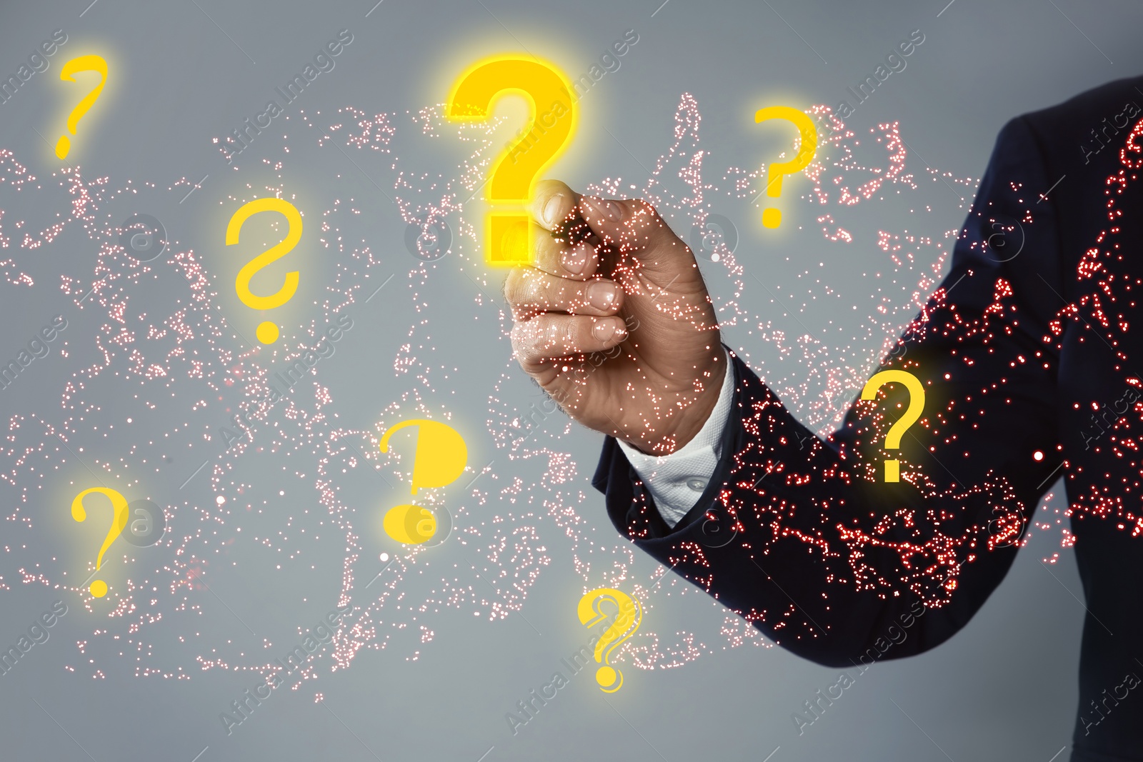 Image of Businessman using virtual screen with question mark symbols on grey background, closeup