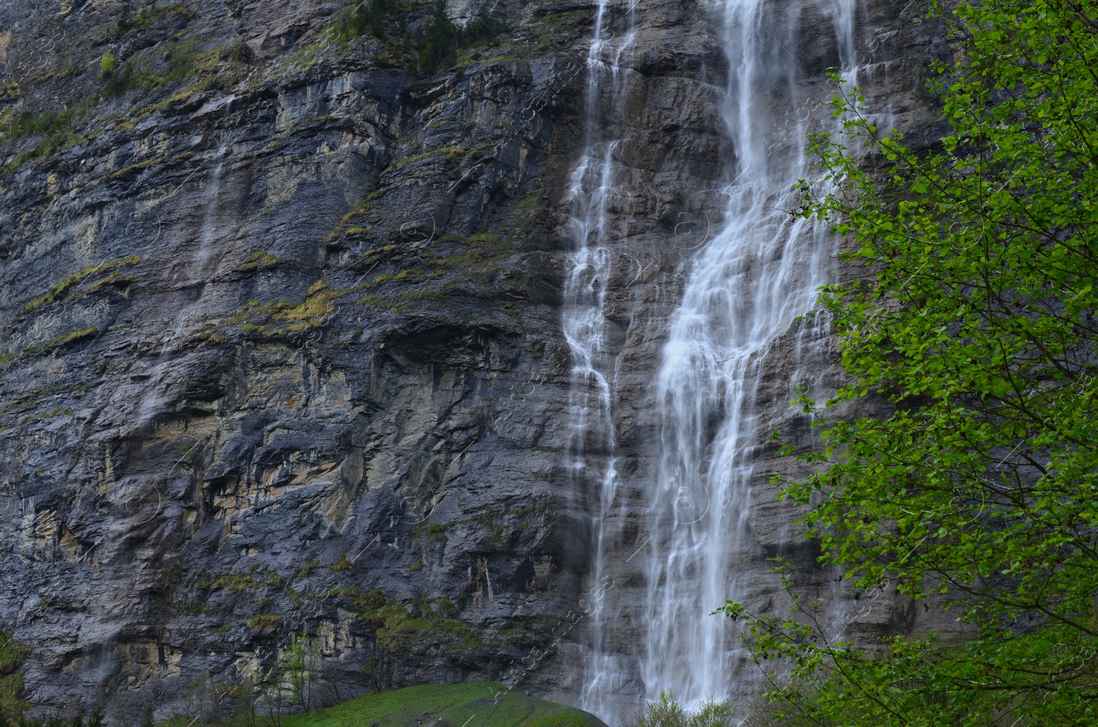 Photo of Picturesque view of beautiful waterfall in mountains