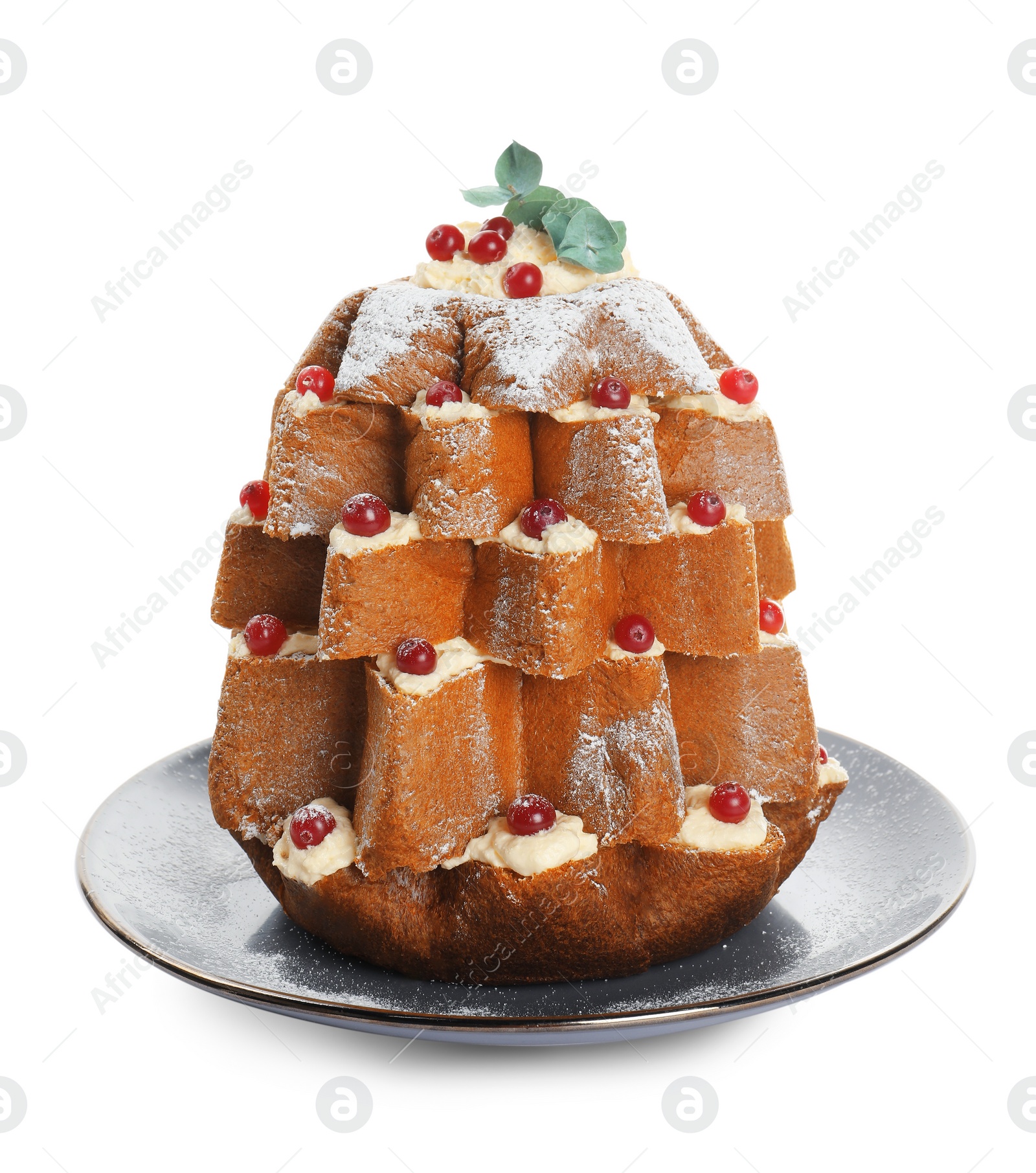 Photo of Delicious Pandoro Christmas tree cake decorated with powdered sugar and berries on white background