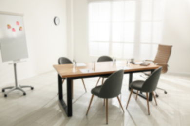 Image of Blurred view of modern office interior 