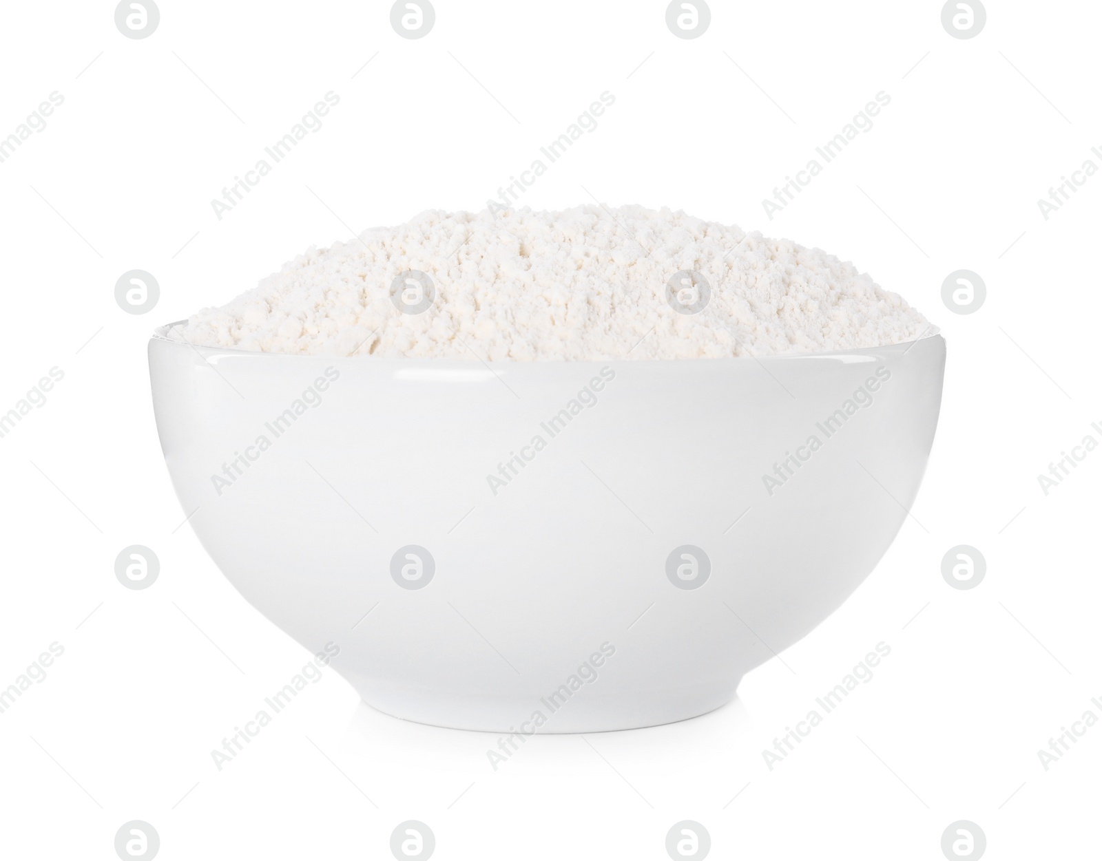 Photo of Bowl with fresh flour on white background