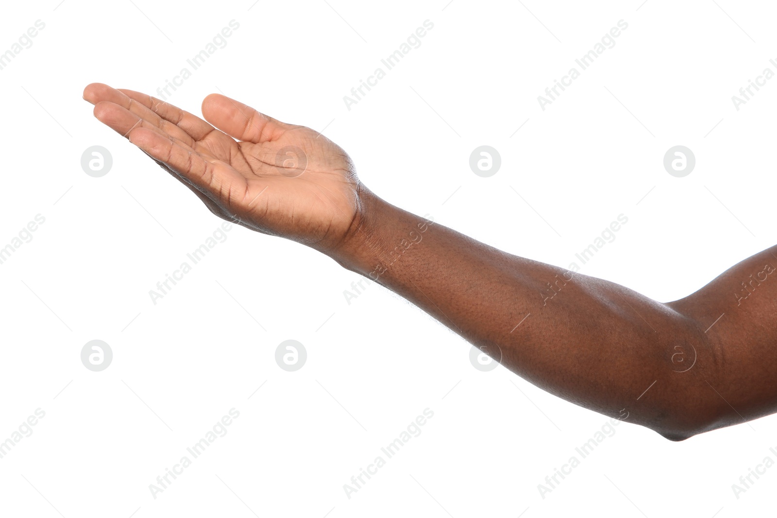 Photo of African-American man holding something in hand on white background, closeup