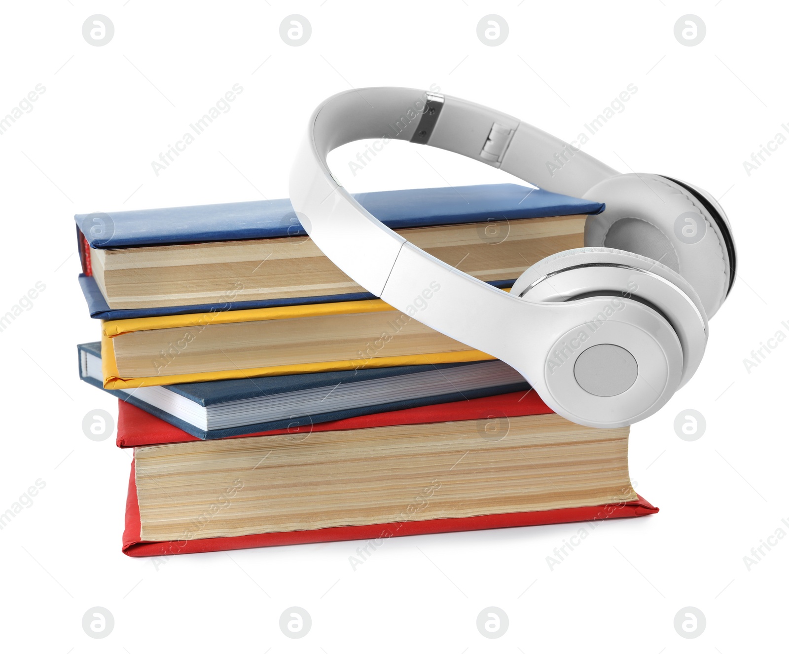 Photo of Books and modern headphones isolated on white