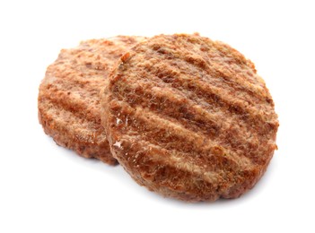 Tasty grilled hamburger patties on white background