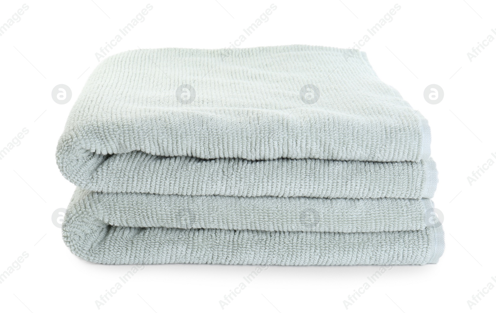 Photo of Soft folded terry towels isolated on white