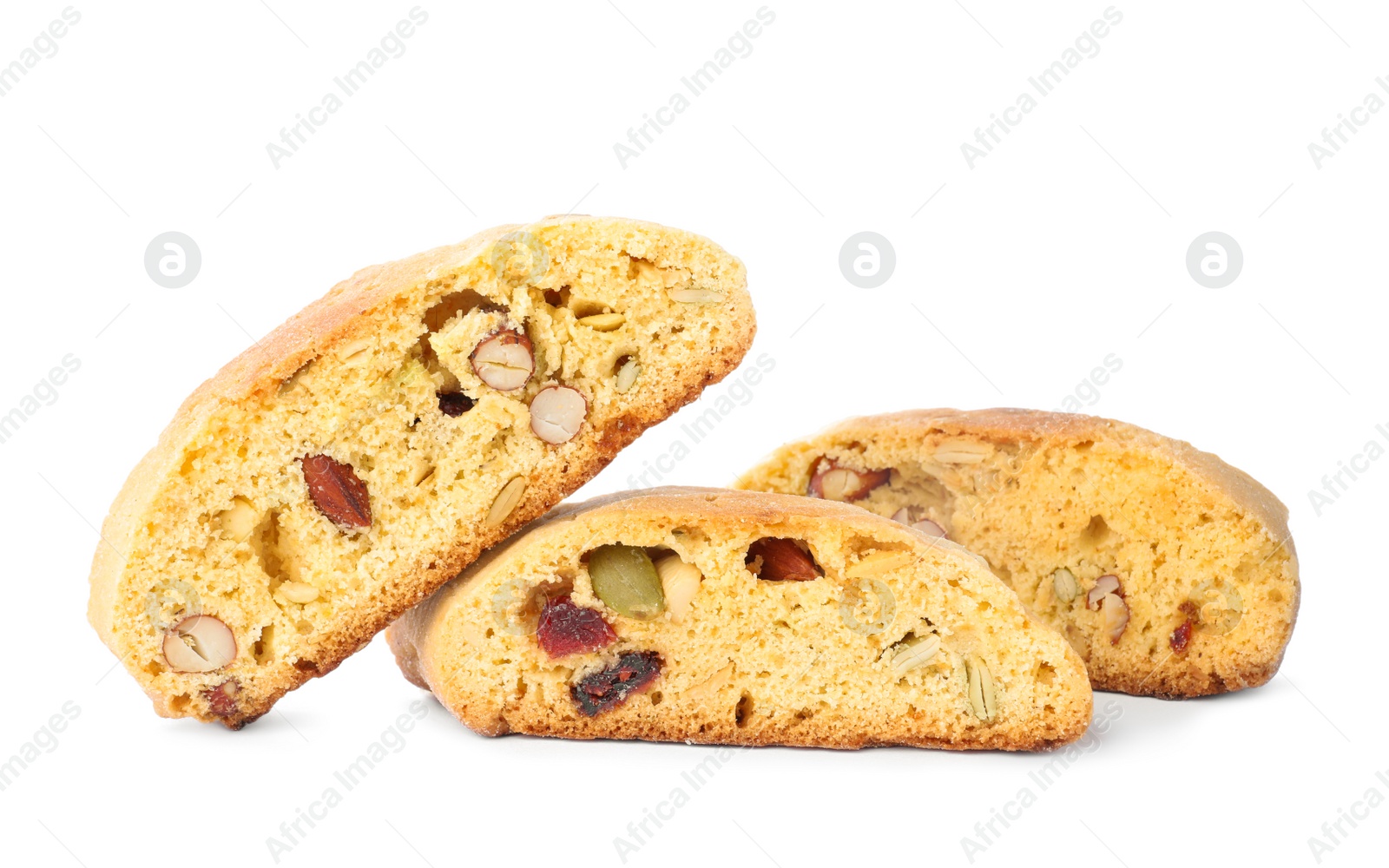 Photo of Slices of tasty cantucci with berry and pistachio on white background. Traditional Italian almond biscuits