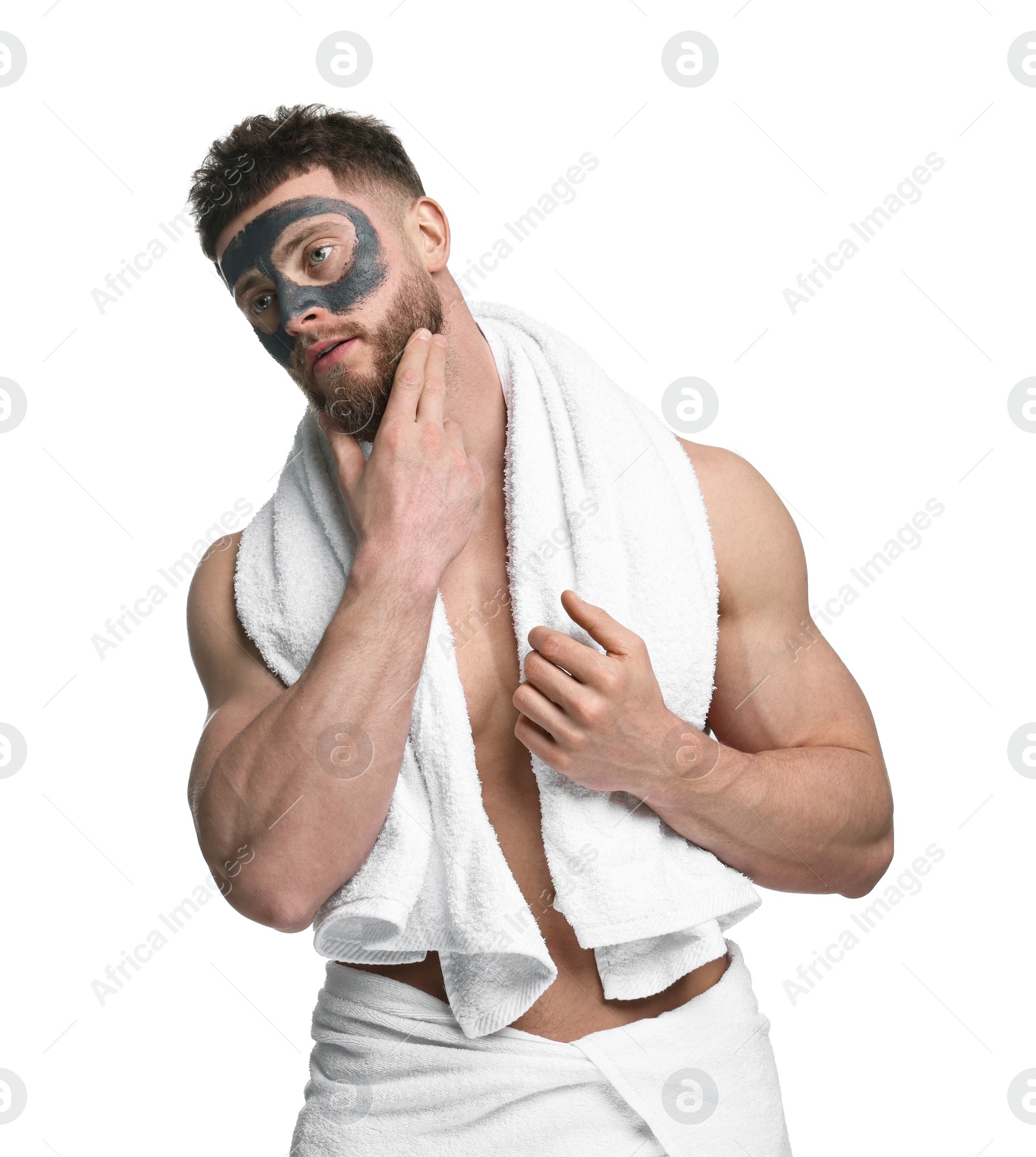 Photo of Handsome man with clay mask on his face against white background