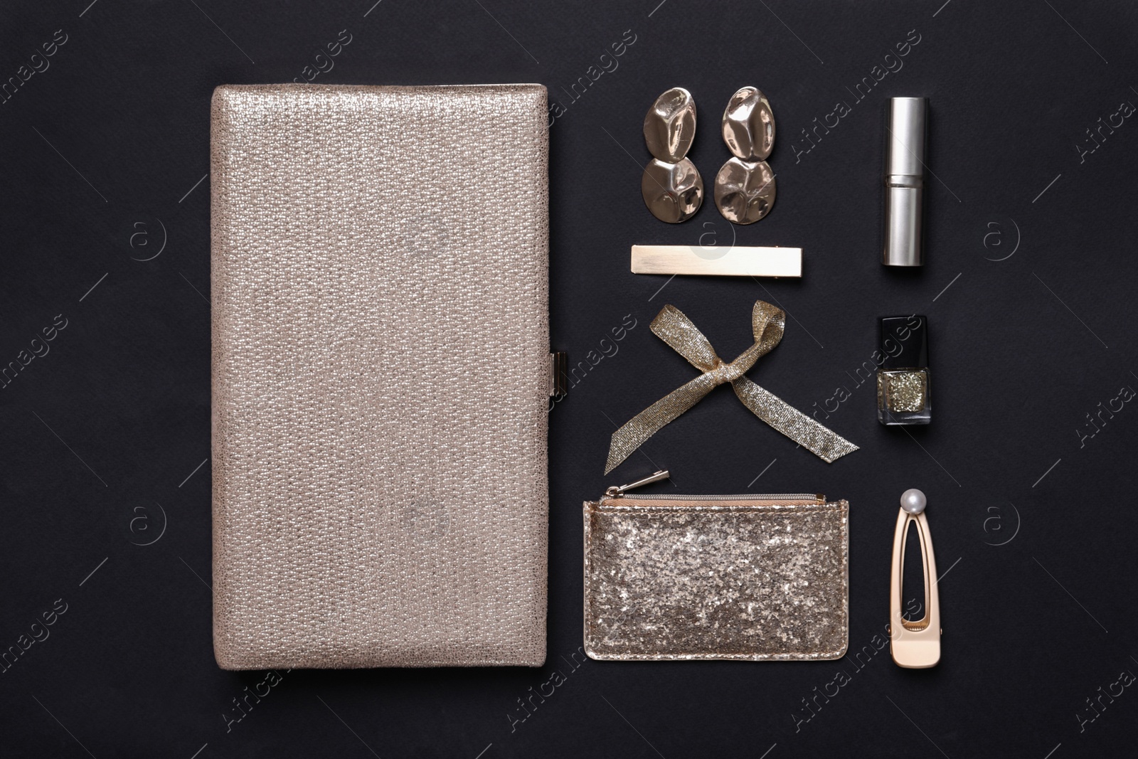 Photo of Flat lay composition with stylish women's accessories on black background