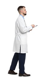 Doctor in coat with clipboard on white background