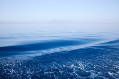 Photo of Surface of beautiful sea water on foggy day