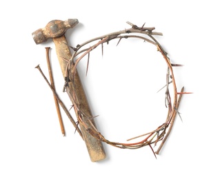 Photo of Crown of thorns, nails and hammer on white background, top view. Easter attributes