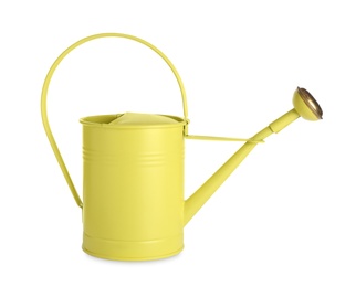 Yellow metal watering can isolated on white