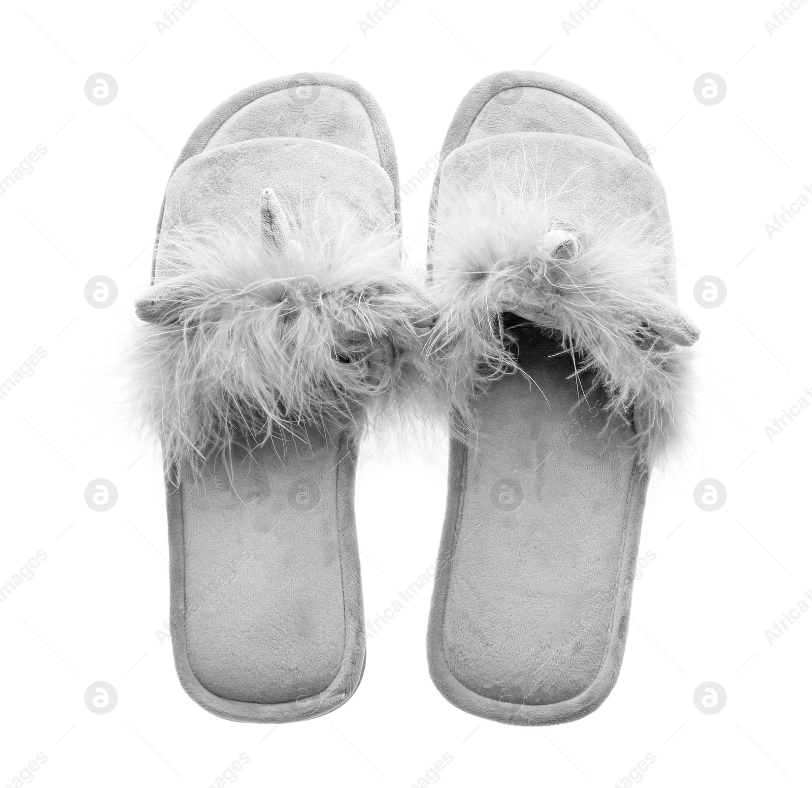 Photo of Stylish soft slippers on white background, top view