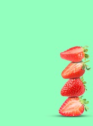 Image of Stack of fresh strawberries on aquamarine background, space for text