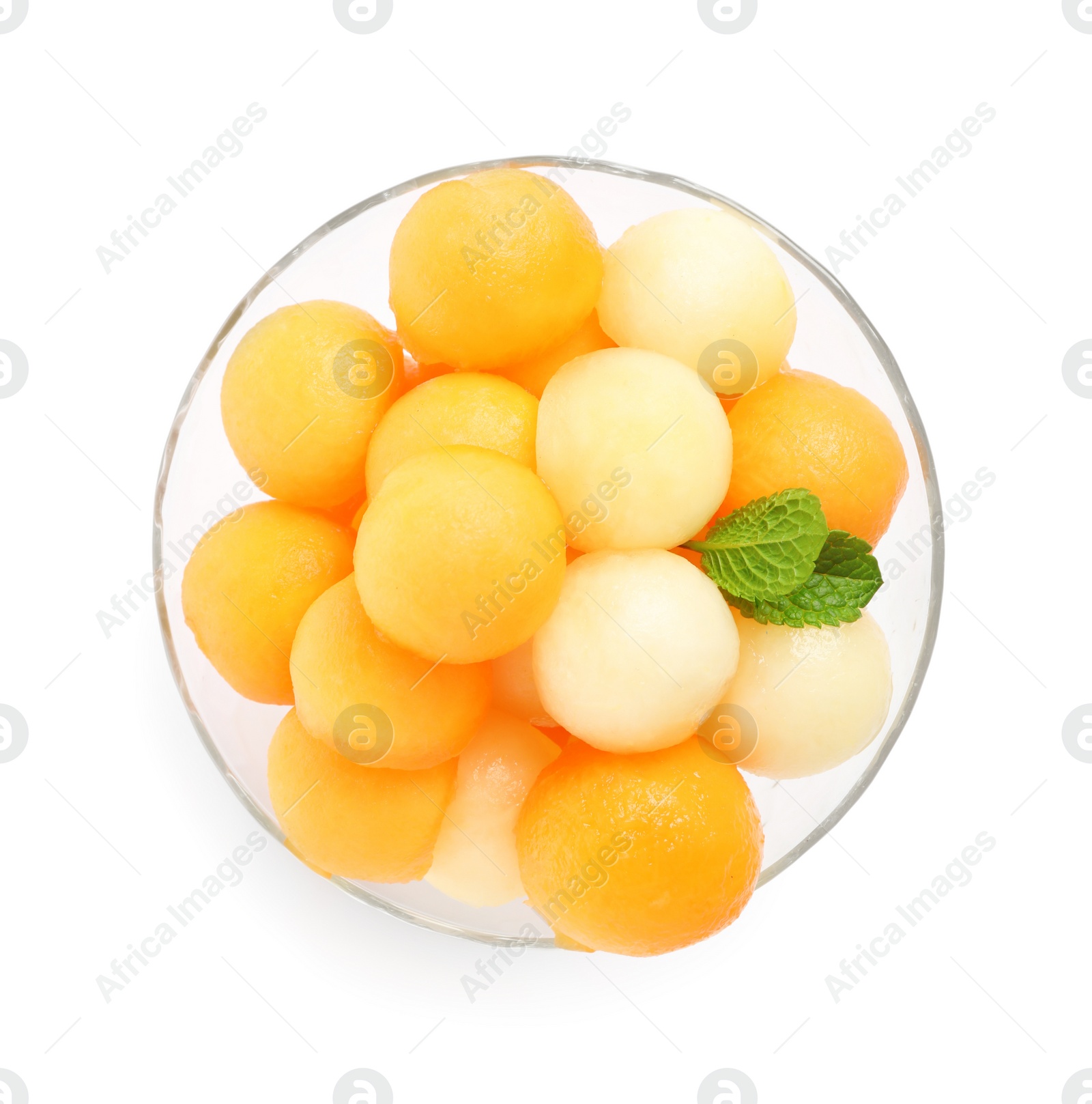 Photo of Melon balls and mint in glass isolated on white, top view