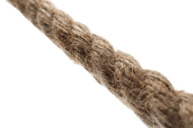 Photo of Hemp rope on white background, closeup. Organic material