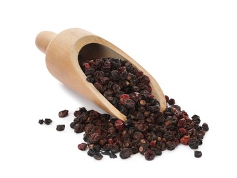 Photo of Scoop with tasty dried currants on white background