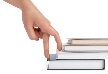 Woman imitating stepping up on books with her fingers against white background, closeup